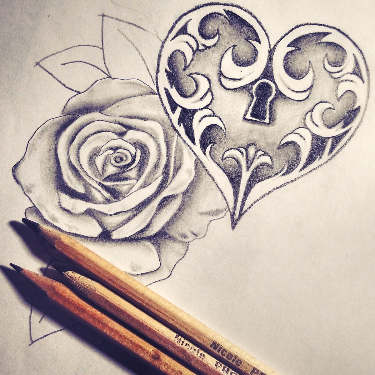 pencil drawing of roses and hearts